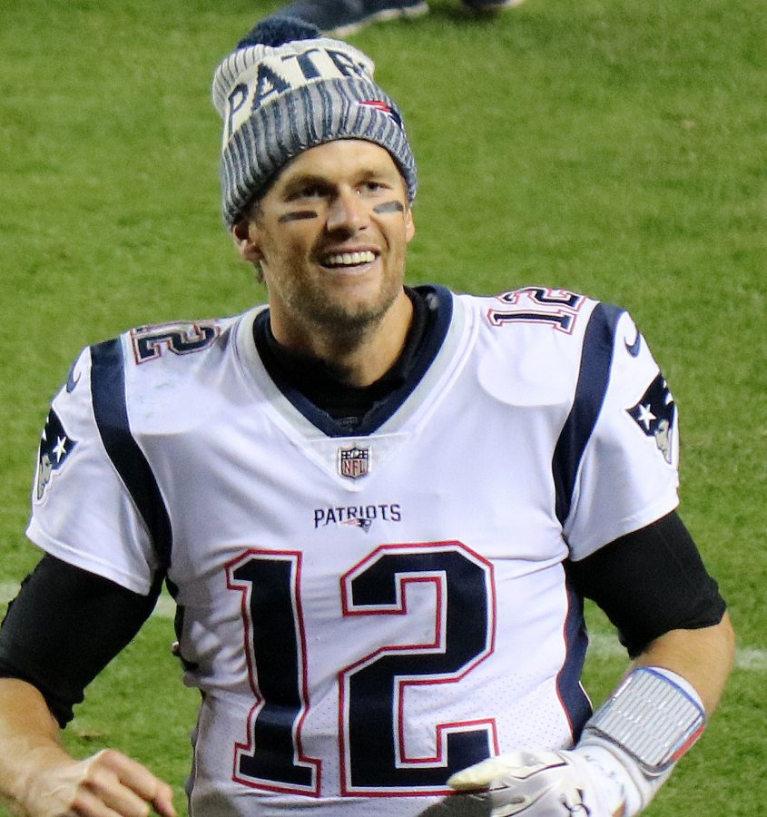 Brady trots off the field smiling after a win in 2017.