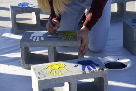 The field house, which was dedicated on Jan. 24, will bear the handprints of the students and coaches in outside sports.