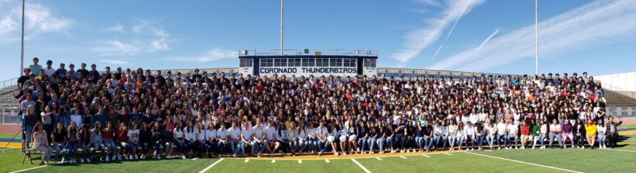 The senior class of 694 students pose for a class photo that they will remember for the rest of their life.  