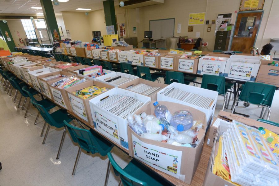 Public elementary school receives aid from Medical Battalion Soldiers due to a shortage of supplies. 